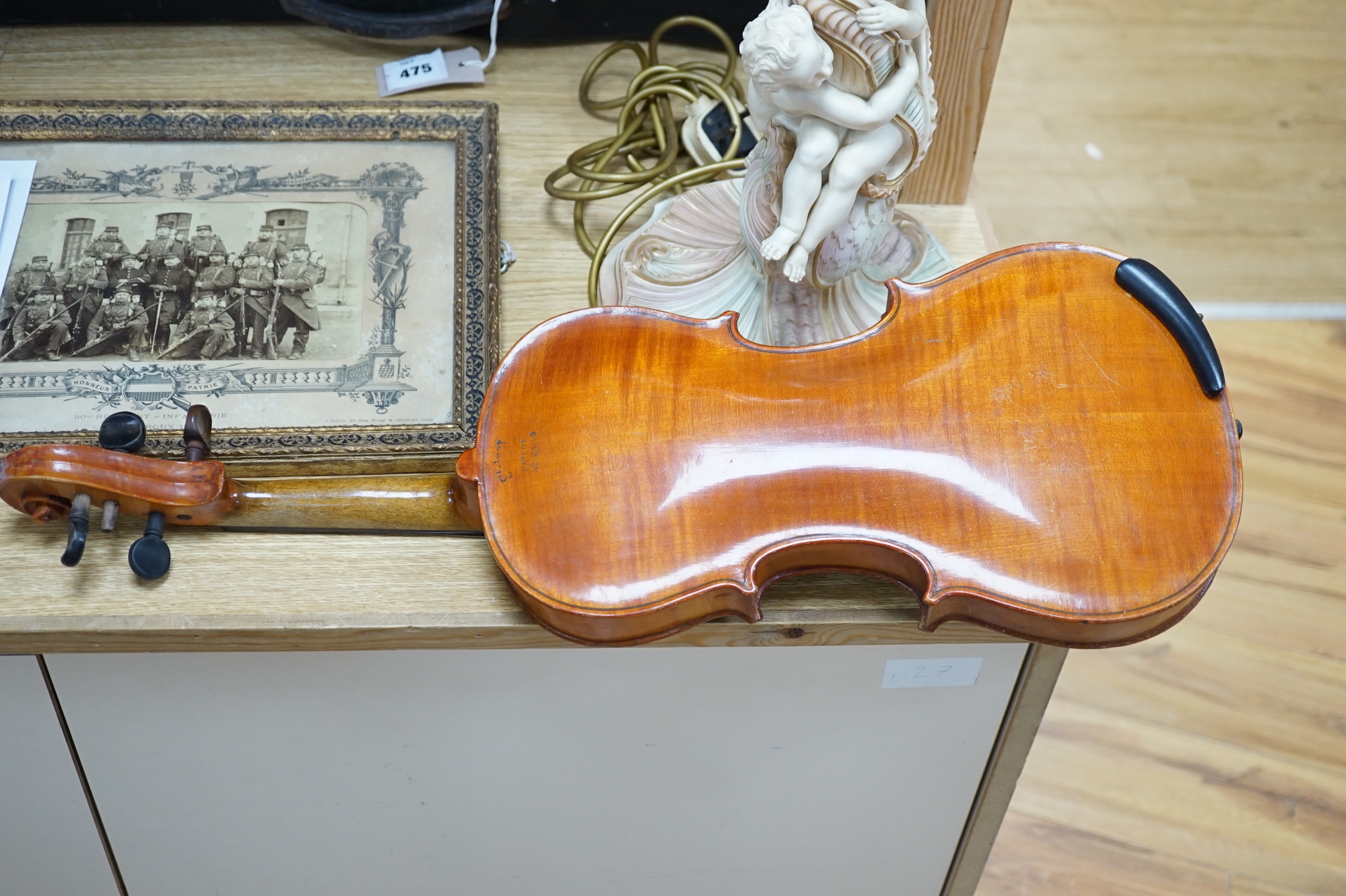 An early 20th century Stainer violin, patent number 23140, back measures 36.5cm excl button. cased